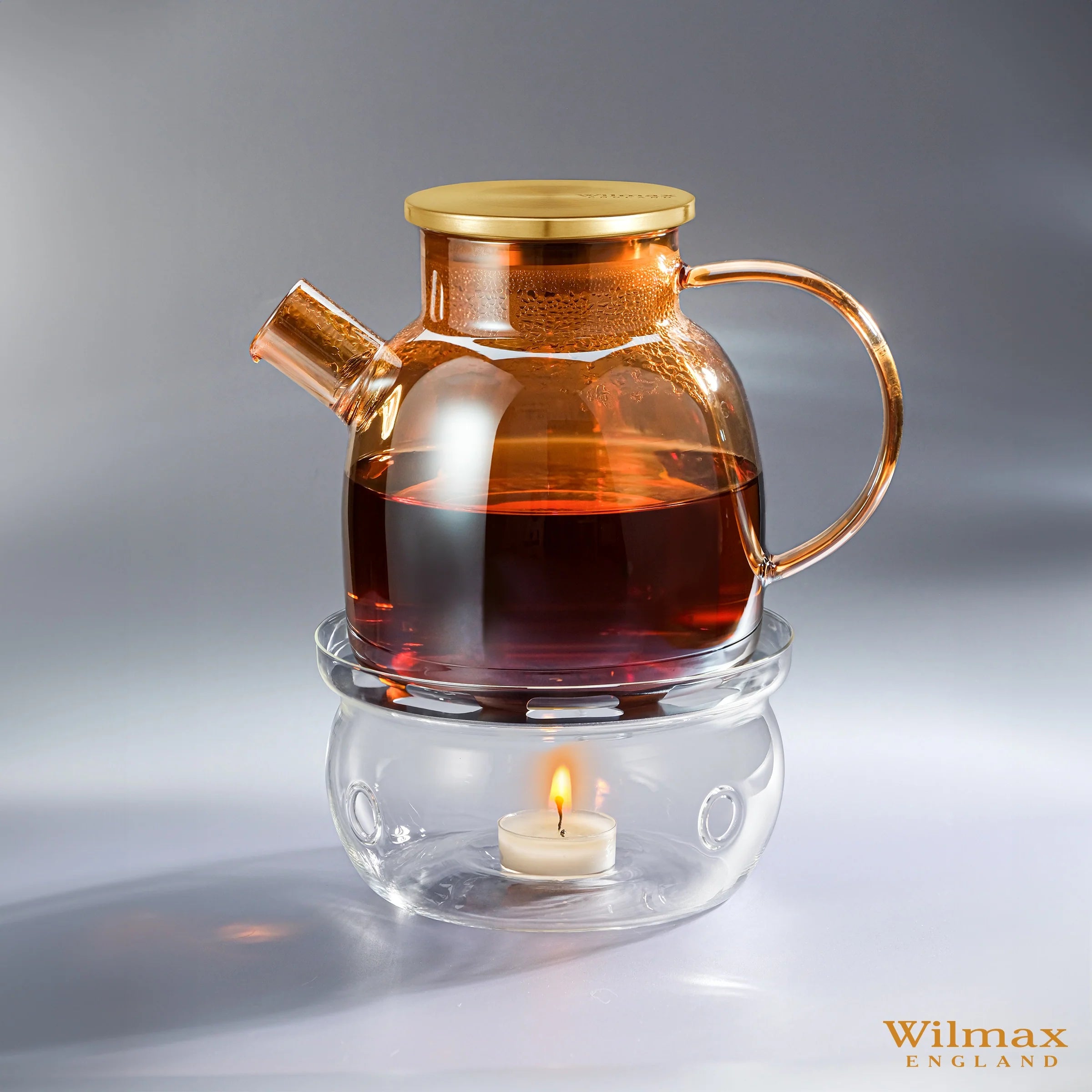 Wilmax Teekanne 1200 ml mit Federfilter und mit Edelstahldeckel Gold aus Thermoglas