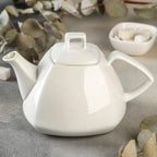 Wilmax Kaffee- und Teekanne mit integriertem Ausgusssieb 1050 ml Weiß aus Porzellan