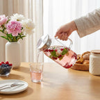 Wilmax Krug 1000 ml mit Edelstahldeckel Transparent aus Thermoglas