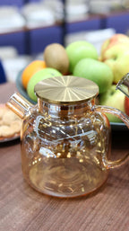 Wilmax Teekanne 1200 ml mit Federfilter und mit Edelstahldeckel Gold aus Thermoglas