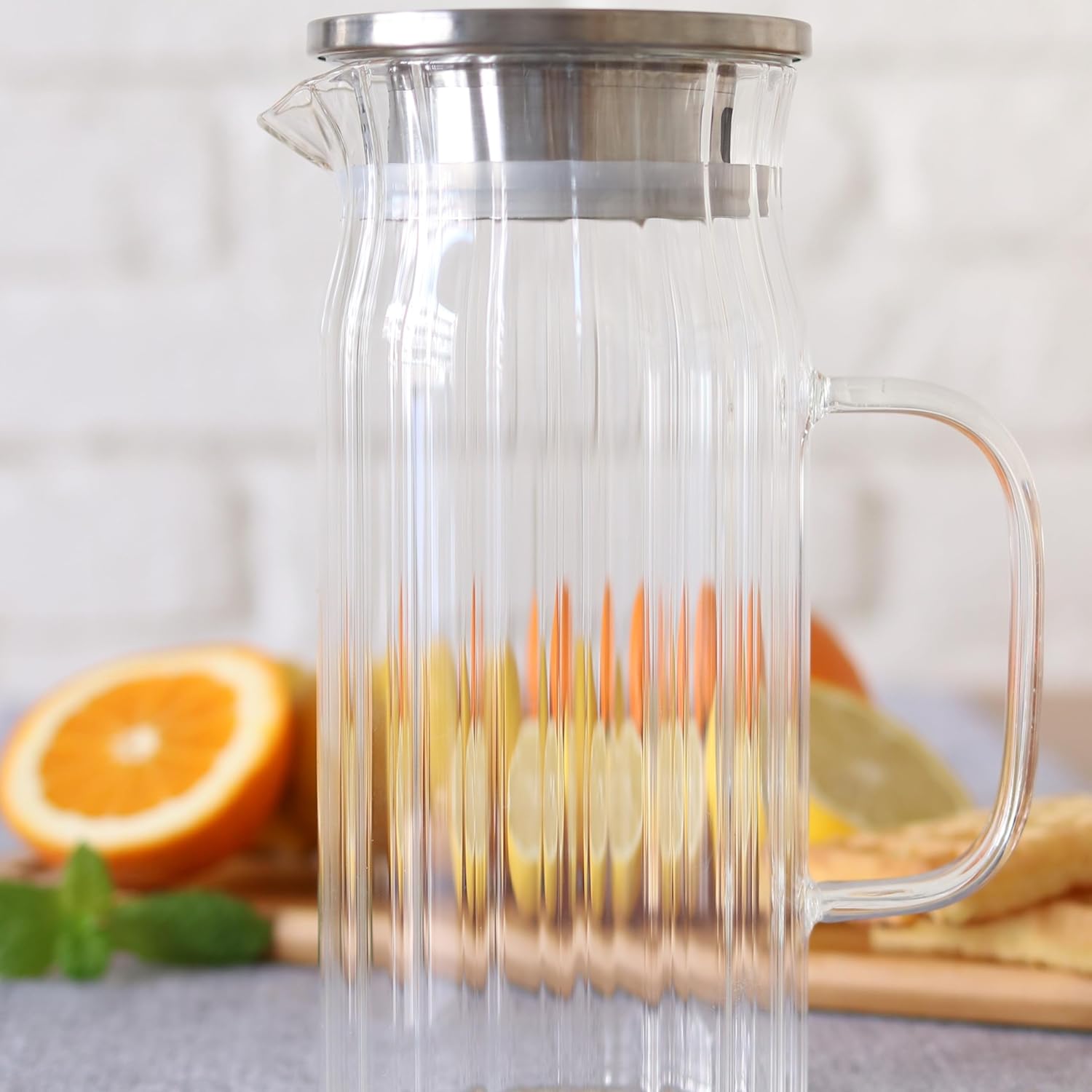 Wilmax Getränkeset 7-teilig mit Krug 1500 ml mit Edelstahldeckel und 6 hitzebeständige Glasbecher mit Henkel 400 ml aus Glas