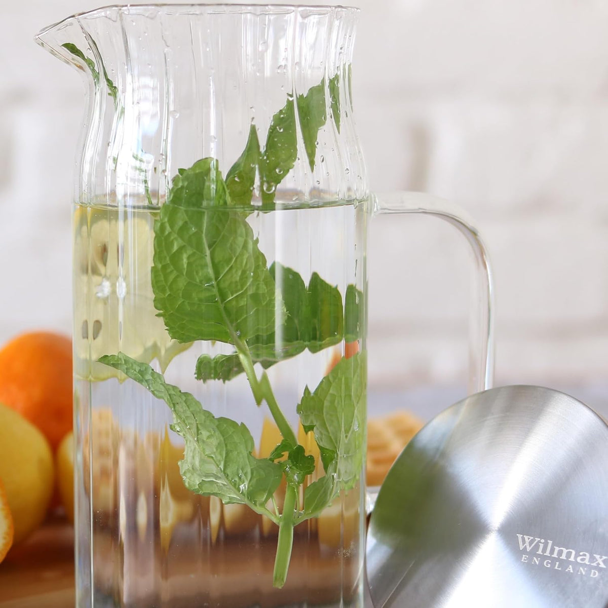 Wilmax Getränkeset 7-teilig mit Krug 1500 ml mit Edelstahldeckel und 6 hitzebeständige Glasbecher mit Henkel 400 ml aus Glas